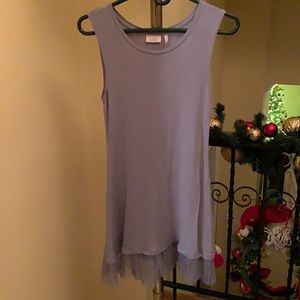 Logo tank top, with layer Swiss dot at the bottom.